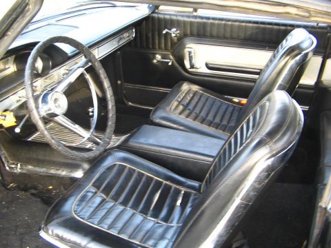 1964 Ford Galaxie - Interior view of a 1964 Ford Galaxie, bucket seats and a classic dashboard.