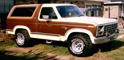 1980 Ford Bronco - This two-tone Ford Bronco features a brown lower body with a white upper section and removable hardtop.