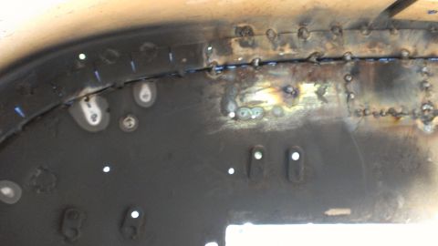 1978 Ford Bronco - Welded metal panel showing repair work with numerous spot welds.