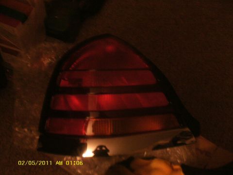 1998 Ford Crown Victoria - Rear tail light assembly for a car, possibly a Ford Crown Victoria.