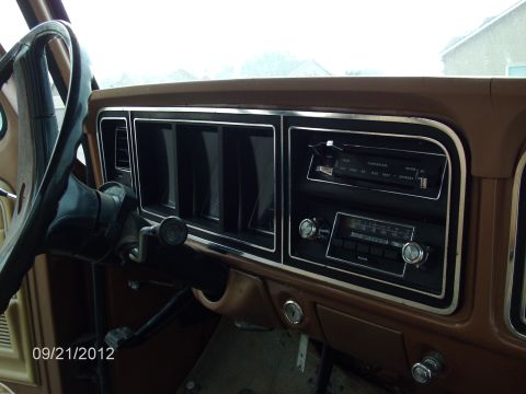 1979 Ford F-150 - Interior view of a 1979 Ford F-150 dashboard, showing the radio and steering column.
