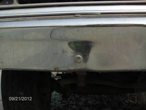 1979 Ford F-150 - A close-up view of a vehicle's front bumper and tire, with a date stamp of 09/21/2012.
