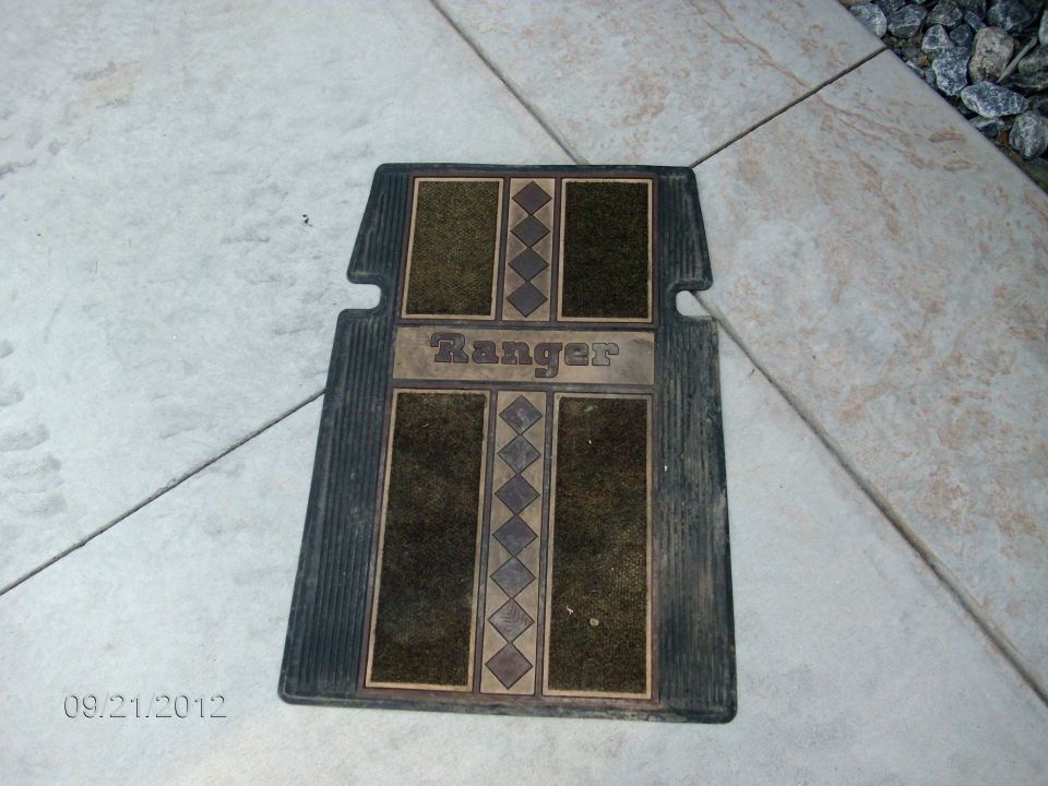 Floor mat with "Ranger" text and diamond pattern