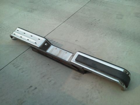 1979 Ford F-150 - This is a bumper assembly, likely from a 1979 Ford F-150, shown on a concrete surface.