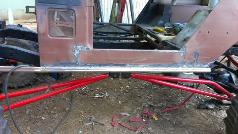 1978 Ford Bronco - Custom off-road vehicle frame and body panels are shown during a repair or modification process.