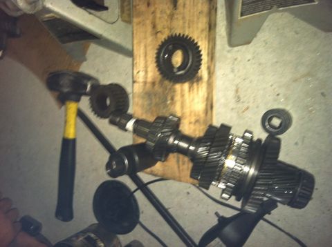 1993 Ford Probe - Transmission gears and a hammer are visible in this close-up shot.