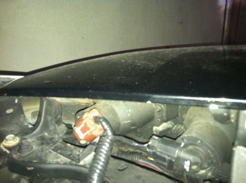 1993 Ford Probe - Detail of an electrical connector and wiring harness, likely from an automotive component.