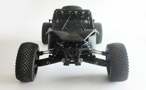 1986 Ford Bronco - This RC buggy features a roll cage and multiple lights on the roof.