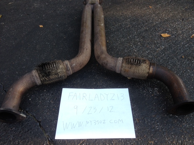 Exhaust pipes with a handwritten note that says FAIRLADYZ13 9/23/12 WWW.MY350Z.COM