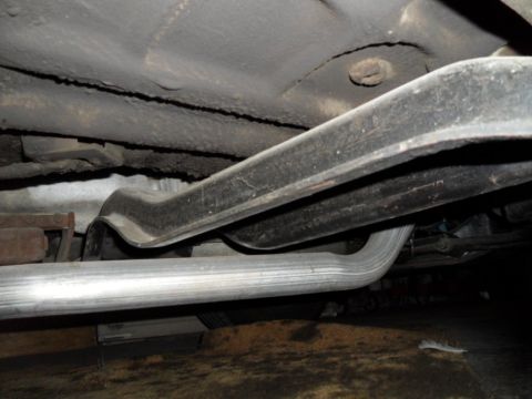1973 Ford Ranchero - Underside view of a vehicle's exhaust system and frame components.