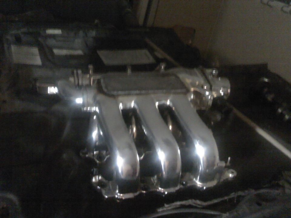 chrome intake manifold with four pipes