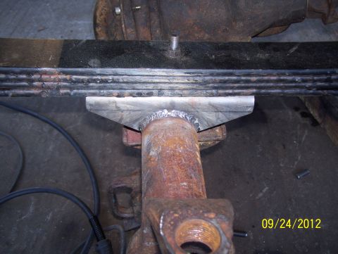 1990 Ford Bronco - Leaf spring and axle assembly with a custom welded bracket, photographed in 2012.