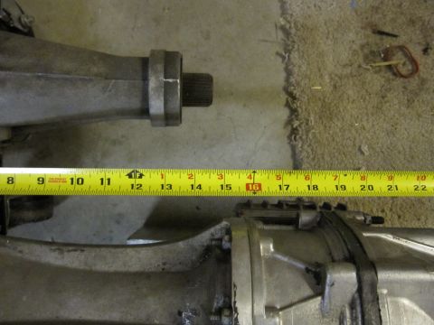 1971 Ford Ranchero - A close-up shows a transmission part being measured with a yellow tape measure, with "SUPERMOTORS.NET" visible at the bottom right.