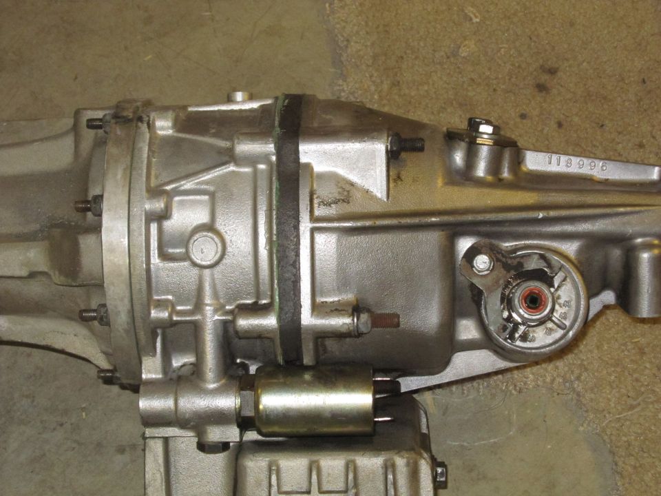 Transmission part with visible number 118996 and SuperMotors.net logo