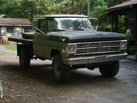 1979 Ford Bronco - This vintage Ford truck, likely from the late 1960s, features a flatbed and a classic grille design.