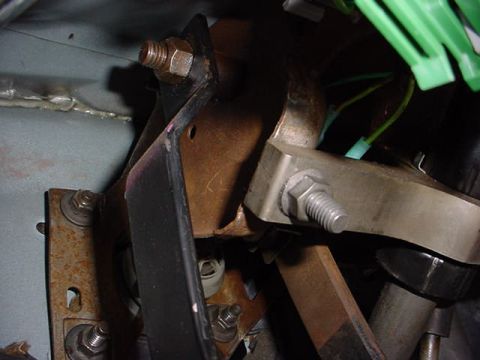1991 Ford LTD Crown Victoria - This image shows the brake pedal assembly and wiring inside a vehicle's cabin.