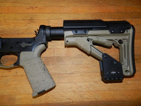 1996 Ford Bronco - AR-15 lower receiver assembly with an adjustable stock and pistol grip.