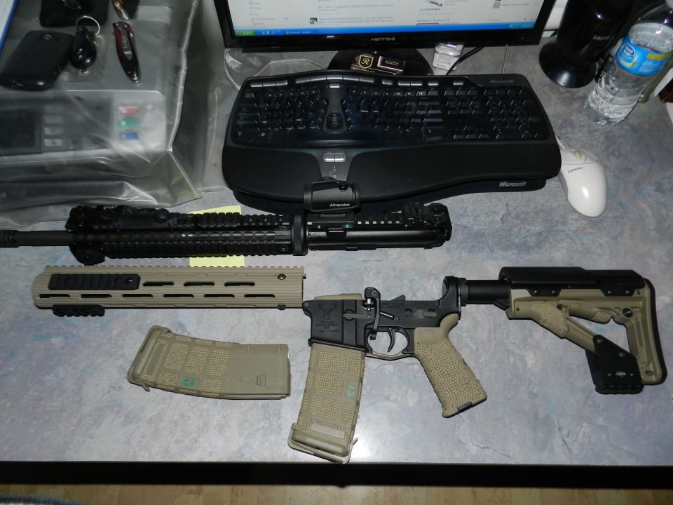Assault rifle with tan stock and magazine, red dot sight