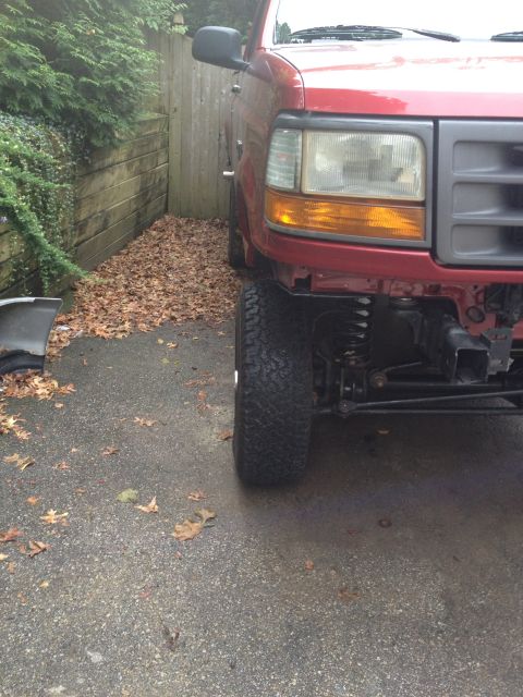 1996 Ford F-150 - Front passenger side view of a 1996 Ford F-150 with the bumper removed.
