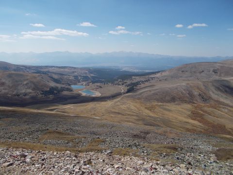 1986 Ford Bronco II - Scenic mountain vista with lakes and distant peaks, captured on a clear day.