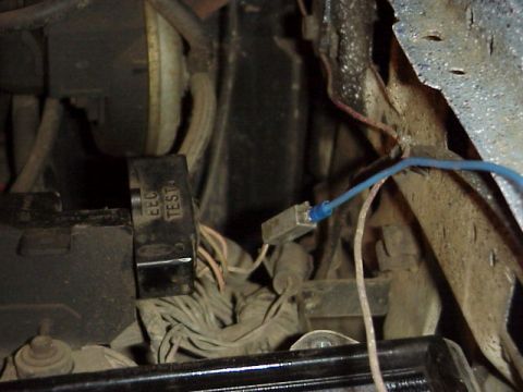 1989 Ford Bronco - Close-up of engine bay wiring and an EEC test connector, likely from a Ford vehicle.