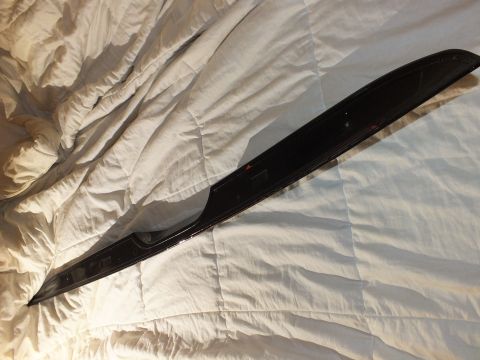 2003 Ford Crown Victoria - Mounting underside of a long black decklid spoiler on a quilted comforter