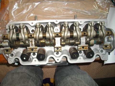 1989 Ford Probe - Close-up of an engine's cylinder head, showing the internal valve train components.