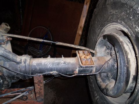 1989 Ford Bronco - Close-up of a rear axle assembly, showing handwritten measurements and markings.
