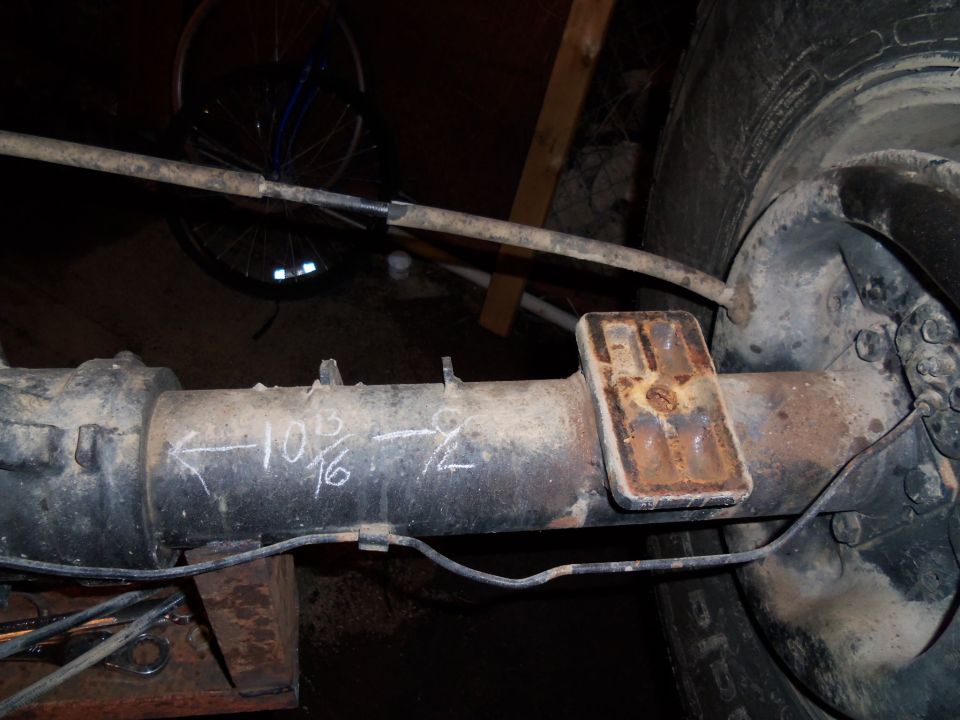 Rear axle housing with chalk measurements '10 3/16' and '-9/2'