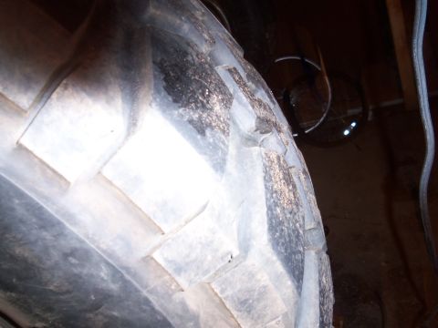 1989 Ford Bronco - Tire tread detail, likely from a truck or off-road vehicle.