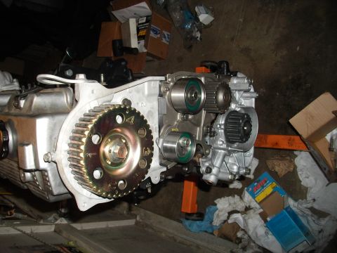 1989 Ford Probe - Close-up of engine timing belt components, possibly during a repair or rebuild.