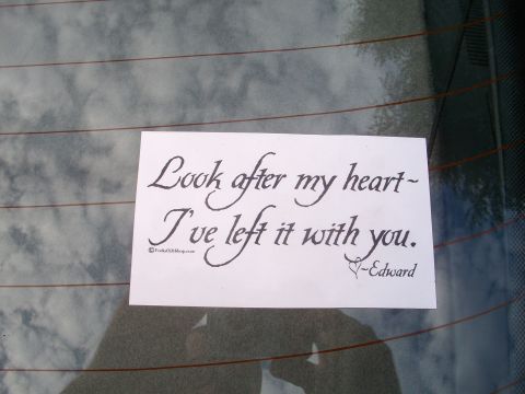 1989 Ford Probe - A handwritten sticker with a romantic message is affixed to the rear window of a vehicle.