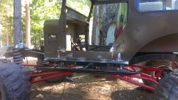 1978 Ford Bronco - This off-road vehicle chassis appears to be undergoing modification or is in a state of disrepair.