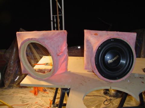 1999 Ford Taurus - Custom subwoofer box being built, one speaker installed. The other side is empty.
