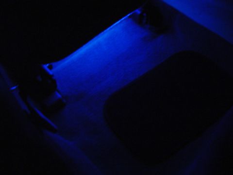 1999 Ford Taurus - Blue LED lighting illuminates the interior floor of a vehicle.