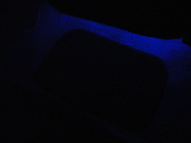 blue ambient light strip on car interior floor