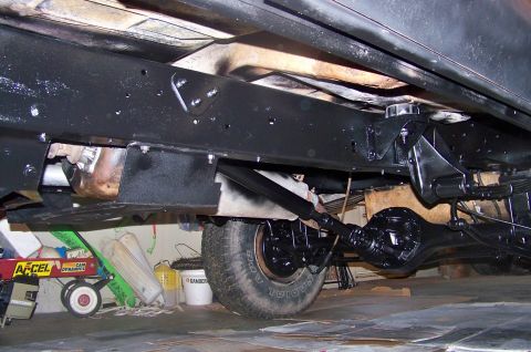 1978 Ford Bronco - The underside of a 1978 Ford Bronco shows its robust frame and suspension components.