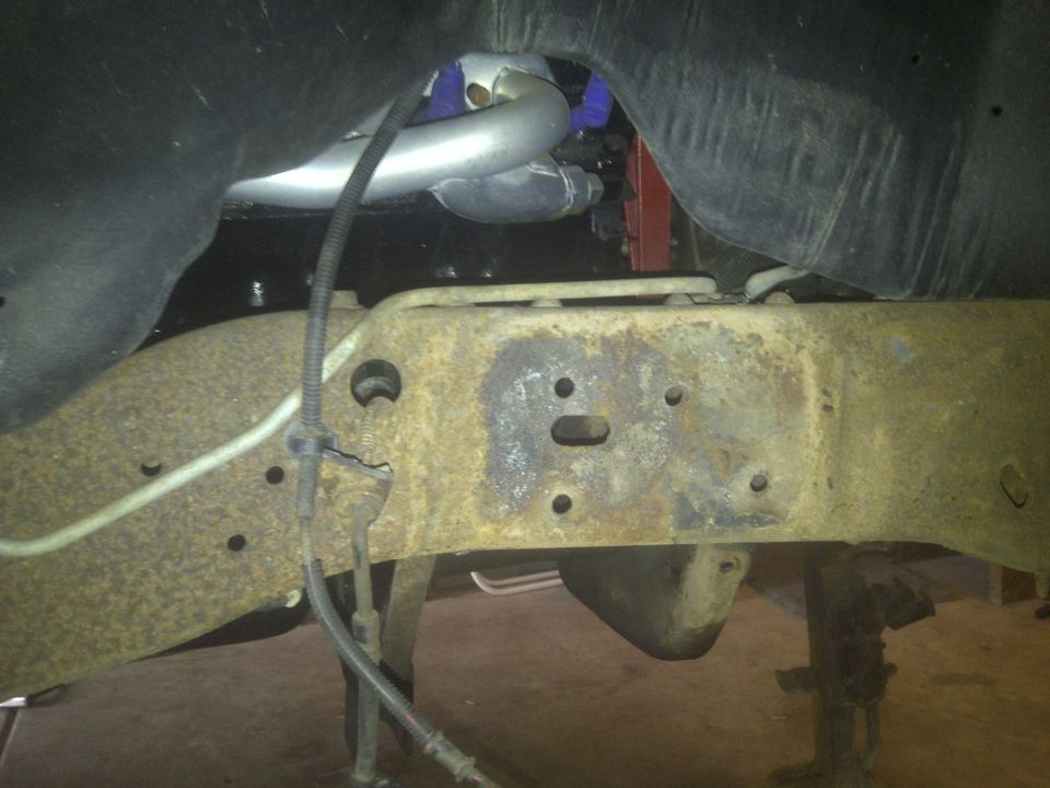 Pass side coil bucket removed