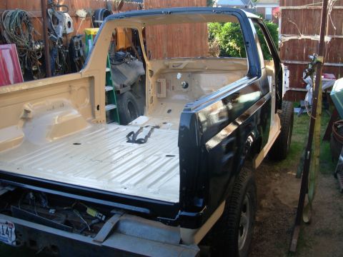 1983 Ford Bronco - This 3rd coat of black isn't perfect, but the body now has a lot more paint coverage than the factory put on.
