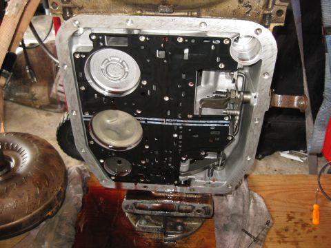 1994 Ford Bronco - The gasket, spacer, and check balls stay with the Valve body when it is removed. The cylinders on the left are, from top to bottom; Overdri…