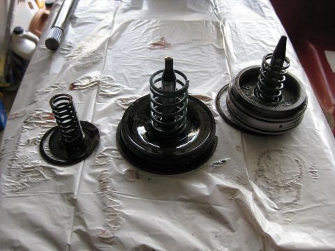 1994 Ford Bronco - From left to right; 2-3 accumulator Low / Reverse servo Overdrive servo Note: there is a piece missing from the 2-3 Accumulator in this pic…