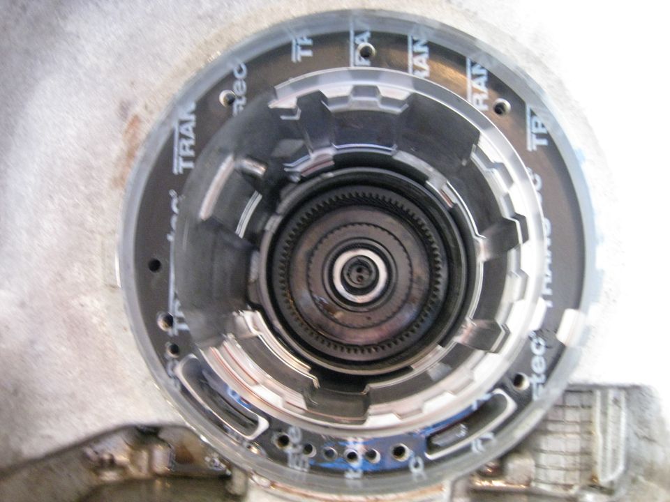 Planetary Gearset and anti rattle spring removed. If you look closely you can see the reverse band still installed.