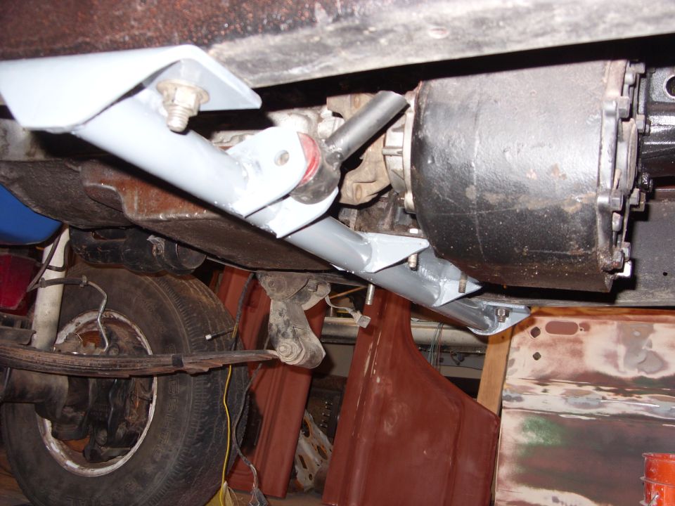 1967 Ford F-250 undercarriage with leaf springs, differential, and gray painted support brackets