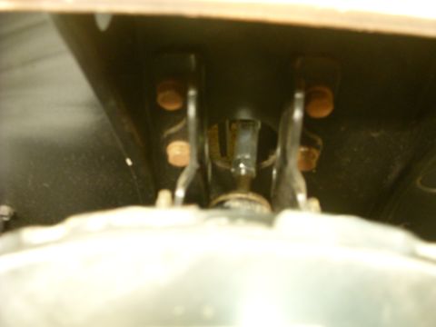 1967 Ford F-250 - Underside view of vehicle suspension components with visible rust on bolts.