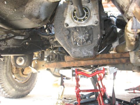 1981 Ford Bronco - Transmission bolted to the engine and hanging on its own strength. A little deceiving in this picture because, no, the blocks of wood are n…