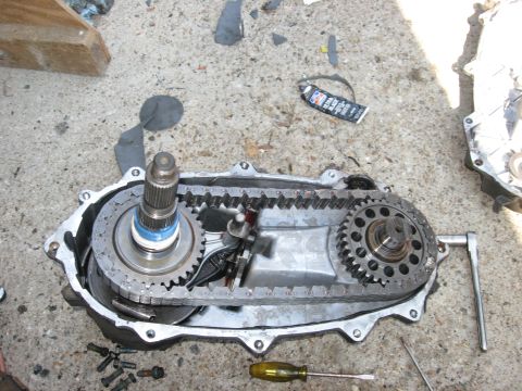 1981 Ford Bronco - The shorter shaft is put in. Have to slide the chain around both gears and then drop both sides in at the same time.