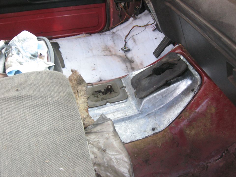 The white insulation on the driver's side is some I put in last year after replacing the fully rotted out floor pan.