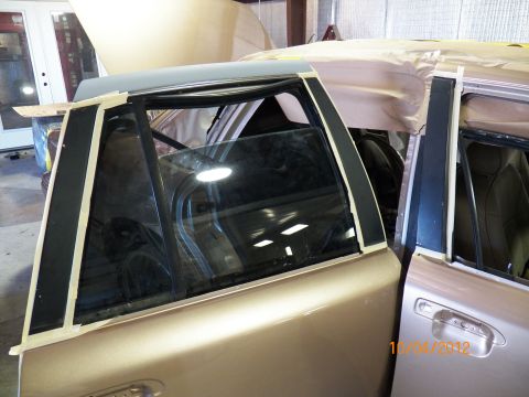 1993 Ford Crown Victoria - Taping the window pillars to have them scuffed and repainted black.