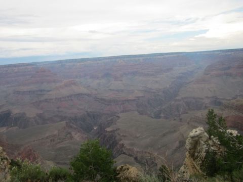 1991 Ford LTD Crown Victoria - View of the Grand Canyon, a vast geological formation with layered rock strata and deep ravines.