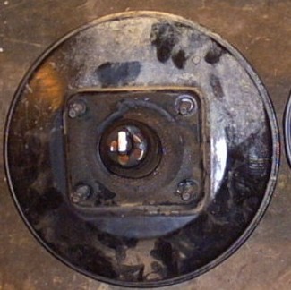 1991 Ford LTD Crown Victoria - A brake booster part is shown in this close-up image, with the Supermotors.net logo visible at the bottom.